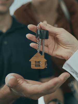 Man taking key for first house new mortgage